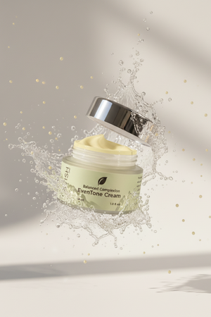 Skincare cream jar with a silver cap on a light gray background